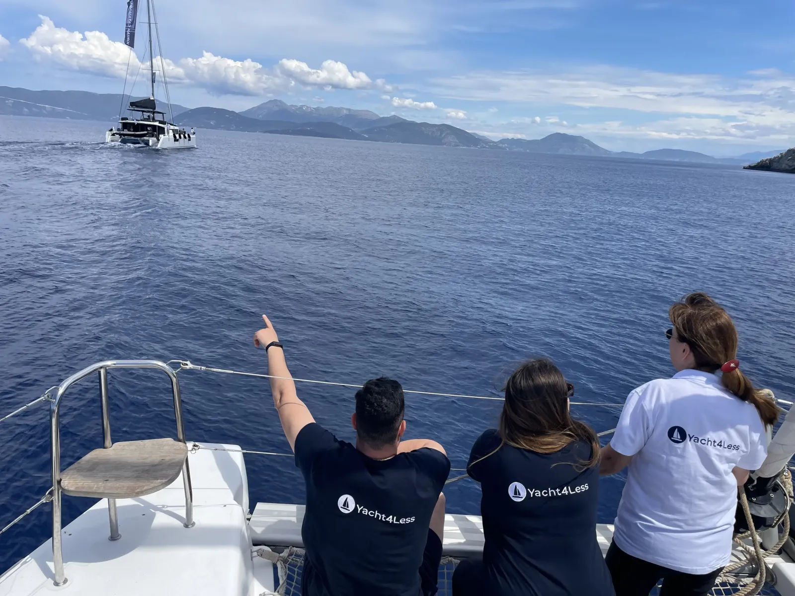 Yacht4less team of yacht charter brokers on a catamaran charter sailing in Greece